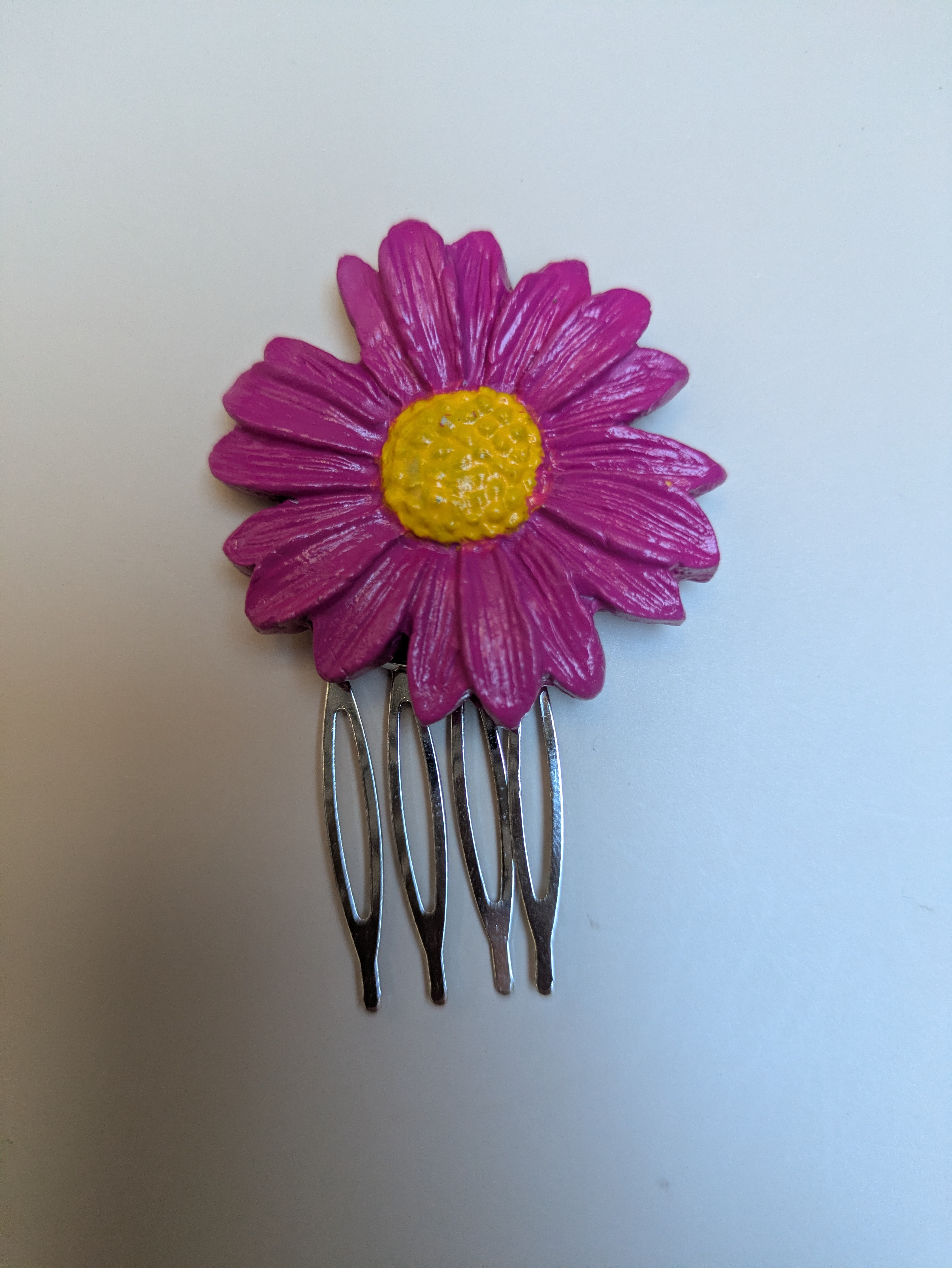 Peigne marguerite rose